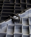 Close-up of interlocking mechanism of Interlocking Garage Floor Tiles Diamond Pattern Non Slip Heavy Duty Copolymer 12X12 Inch Modular Tiles 48 Pack Black Easy Snap In Installation For DIY Garages And Workspaces.