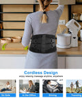 Woman wearing Cordless Back Heating Pad With 3 Heat Levels And 3 Vibration Modes, 10000mAh Portable Massager for Lower Back Pain Relief.