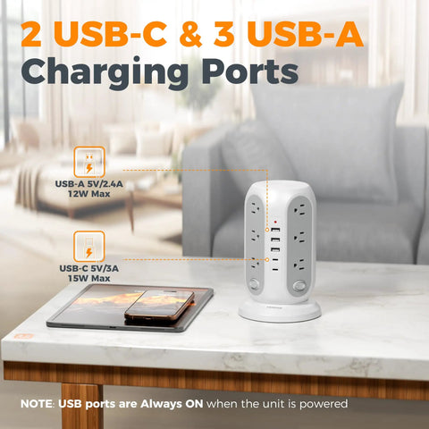 Tower Power Strip With 12 Outlets And 5 USB Ports, Including 2 USB C, Individual Switches, 10 Ft Flat Extension Cord, 1250W Surge Protector, All In One Charging Station For Office Or Dorm, Grey, shown on a table by a couch.