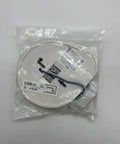 TrueAlarm CO Sensor Base With 520 Hz Sounder For Fire Alarm Systems, packaged in clear plastic bag, view from top.