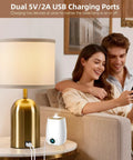 Couple using Touch Control Gold Bedside Table Lamps Set Of 2 with USB ports in living room