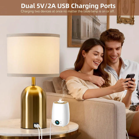 Couple using Touch Control Gold Bedside Table Lamps Set Of 2 with USB ports in living room