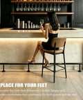 Heavy Duty Stainless Steel Bar Foot Rails And Kick Rack Brackets For Island Kitchens, Beefy Rustproof Footrest Holders sitting at a bar.