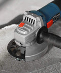 Diamond Concrete Grinding Wheel 5 Inch Cup Wheel in use on concrete surface for stone, cement, marble, granite, and thinset removal.
