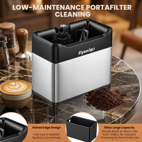 Automatic Electric Portafilter Puck Cleaner With Scrapers And Brush Heads For 51MM And 58MM Espresso Machines on countertop with coffee grounds.