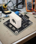 Dead Simple Hall Effect Current Sensor Module With 100A Rating, isolated board for current monitoring in electronics projects.