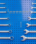 Rock Solid And Built Tough 80 Piece Peg Board Hooks And Bins Set For Garage Tool Storage Wall Mount Organizer With Steel Pegs showing organized steel wrenches on a blue pegboard.