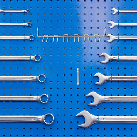 Rock Solid And Built Tough 80 Piece Peg Board Hooks And Bins Set For Garage Tool Storage Wall Mount Organizer With Steel Pegs showing organized steel wrenches on a blue pegboard.