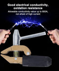 Practical 800 Amp Grounding Brass Welding Clamp With Durable Rubber Sleeve For Heavy Duty Metal Fabrication Jobs And Easy Installation On Various Surfaces Right Now holding electricity with black wire.
