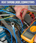 Pro Grade Crimping Tool For Heat Shrink Connectors Kit With 300 Marine Grade Heat Shrink Wire Connectors in use with tester