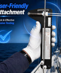 Pro Grade Hands Free Rigging Tension Gauge For Sailboat Shrouds And Wire Rope Standing Rigging Forestays And Cable Rigs Fits Nine Thirty Second Inch Nine Sixteenth Inch And Three Eighths Inch Cables Up To Four Thousand Five Hundred Pound Capacity, gloved hand on sailboat cable