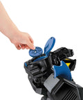 Child inserting disc into DC Super Friends RC Transforming Bat Bot 2-Foot Tall Robot With Lights And Sounds Remote Control.