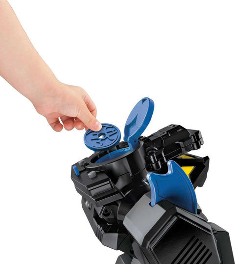 Child inserting disc into DC Super Friends RC Transforming Bat Bot 2-Foot Tall Robot With Lights And Sounds Remote Control.