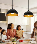 Family enjoying a meal under Two Pack Black And Gold Dome Farmhouse Pendant Lights For Kitchen Island And Dining Room
