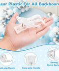 Hand holding a 3.5 inch clear plastic spring clamp from the 10 Pack Balloon Arch Clips Kit for backdrops and decorations