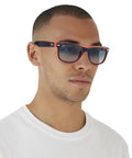 Man wearing RB2132 New Wayfarer Gradient Sunglasses Unisex Small Fit Blue On Orange Frame With Clear Gradient Blue Lenses 55mm