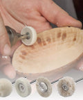 Kickass 20 Pack Wool Felt Buffing Wheels For Dremel Rotary Tools 25Mm Diameter used on wood surface with polishing tool.