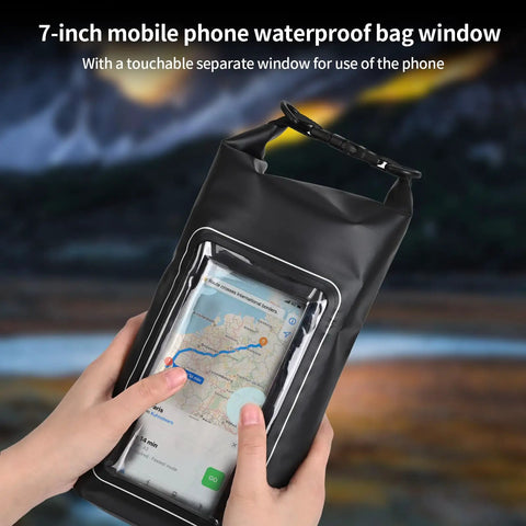 Hands holding 2L Roll Top Waterproof Dry Bag With Integrated Sealed Clear Phone Pouch For Boating Fishing And Travel Heavy Duty Black Dry Pack