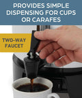 Hand using two-way faucet on 100 Cup Commercial Coffee Urn With Automatic Temperature Control Fast Brewing Easy Clean Up NSF Approved Large Capacity Keeps Joe Hot All Day Silver For Large Events