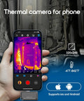 Hand holding smartphone with thermal imaging camera displaying heat map, "Smartphone Thermal Imaging Camera With 320x240 IR Resolution For iOS And Android USB-C Compatible -4 F To 842 F Temperature Range Easy App Setup Perfect For DIYers Home And Worksite". Engine components visible in the background.