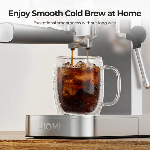 Top Shelf One Touch Espresso Machine With Smooth Milk Frother And Instant Cold Brew Maker pouring cold brew over ice.