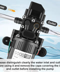Heavy Duty 12 Volt Dc Diaphragm Water Pump With Hose Clamps For Rv Camper Marine And Utility Work showing inlet and outlet ports.