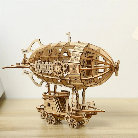 3D Wooden Airship Puzzle Kit For Adults And Teens Brain Teaser DIY Wood Model on a wooden table, side view