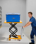 Rock Solid Double Scissor Hydraulic Lift Table Cart 770 Lbs Capacity 51 Inch Lift Height used by worker with blue box in warehouse.