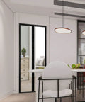 Modern room with Transparent Magnetic Insulated Curtain for Screen Door in doorway, self-closing, 36x82 inches, hands free.