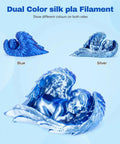 Dope Silk PLA Filament 1.75mm Blue Silver Dual Color Coextrusion angel statue, showcasing glossy surface and dual-tone effect