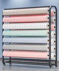 Heavy Duty Metal Rolling Tube Rack For Vinyl Fabric Wallpaper And Craft Film Featuring Smooth Braking Casters And Sturdy Hanging Bar displaying color rolls of vinyl.