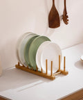 2 Pack Premium Bamboo Dish Rack And Plate Holder With 7 Slots To Level Up Your Kitchen Game displaying plates on countertop.