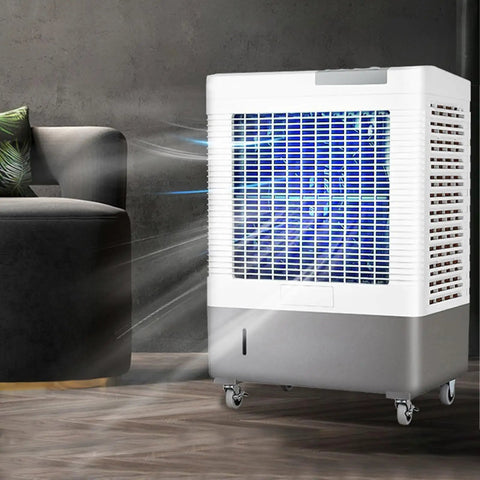 Don't Sweat The Heat With This Portable Evaporative Air Cooler featuring silent swamp cooling and 90° oscillation in a living space.