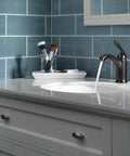 Claymore Single Hole Bathroom Faucet In Oil Rubbed Bronze With One Handle Includes Pop Up Drain for sleek vanity setup