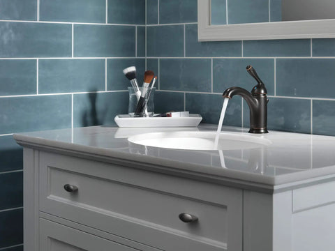 Claymore Single Hole Bathroom Faucet In Oil Rubbed Bronze With One Handle Includes Pop Up Drain for sleek vanity setup