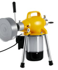 Pro Grade 500W Drain Cleaning Machine With Auto Feed Sewer Snake Auger And 66Ft Carbon Steel Cable To Blast Away Stubborn Clogs And Grease Buildup At Home - close-up view showing the yellow motor and steel cable drum.