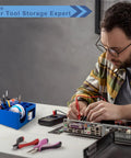 Man using Non Slip Solder Holder And Dispenser Reel Stand With Anti Skid Feet for secure storage next to tools on workbench