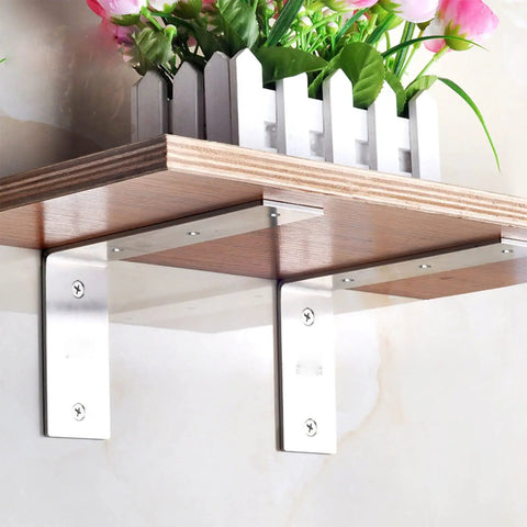 Heavy Duty Stainless Steel Shelf Brackets supporting wooden shelf with flowers, 8.86 inch L corner mounts for DIY upgrades.