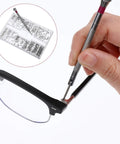 Using 500Pcs Eyeglass Repair Kit With Tiny Micro Screws And Phillips Screwdriver for fixing eyeglasses, with screws visible
