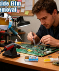 Technician using Rosin Flux Soldering Paste Dope 10 Piece High Purity Cream for precise motherboard repair with tools.