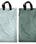 Reusable Hanging Wet Dry Bag Duo For Baby Gear And Travel Needs in cactus patterns, two zippered pockets, nylon handles.