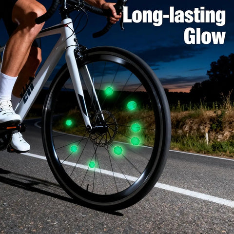 Cyclist on road with 36 Pack Glow In The Dark Luminous Bicycle Wheel Spoke Wrap Tubes in colorful plastic on front wheel.