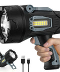 Rechargeable Handheld Spotlight 2,000,000 Lumen Led Flashlight With Cob Light, 10000mAh Battery showcased in hand with charger