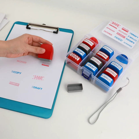 Top Notch Self Inking Stamp Set Boasts A Knockout 12 Pack Of Red And Blue Rubber Stamps on a clipboard with paperwork.