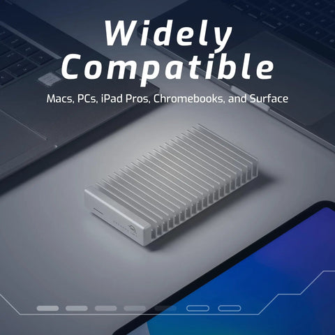 NVMe SSD Enclosure With USB4 Thunderbolt Compatibility, aluminum heatsink for Mac, PC, iPad Pro on desk, top view