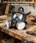Full Face Gas Mask Respirator With Active Carbon Filter For Dust, Gas And Chemical Protection on a workbench