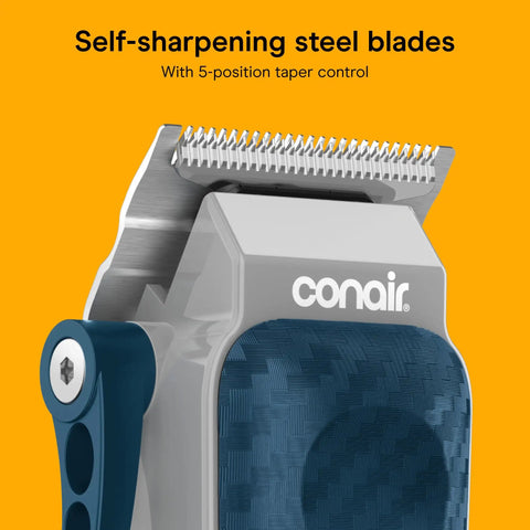 Rechargeable Hair Clippers Kit With Color Coded Guide Combs 17 Pieces close-up of self-sharpening blades on orange background