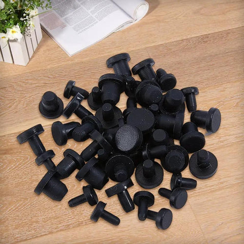 Cool 50 Pack Black Silicone Hole Plugs In 5 Sizes For Pipe And Bottle Ends Waterproof Flexible Rubber Stoppers That Fit Tight Without Leaking Any Liquid Or Mess Up Your Daily DIY Hacks At Home, assorted sizes on table