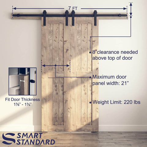 7 Foot Double Barn Door Hardware Kit With Smooth Quiet Sliding Track Easy Install For 21 Inch Wide Door Panel J Shape Hanger Black Includes Detailed Instructions And All Mounting Hardware For Quick No Sweat Level Quiet Operation In Any Interior, front view installed on wooden door.