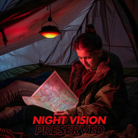 Gen 2 3000LM UFO Camping Lantern Rechargeable Portable Tent Light with red light mode illuminating a person reading in a tent